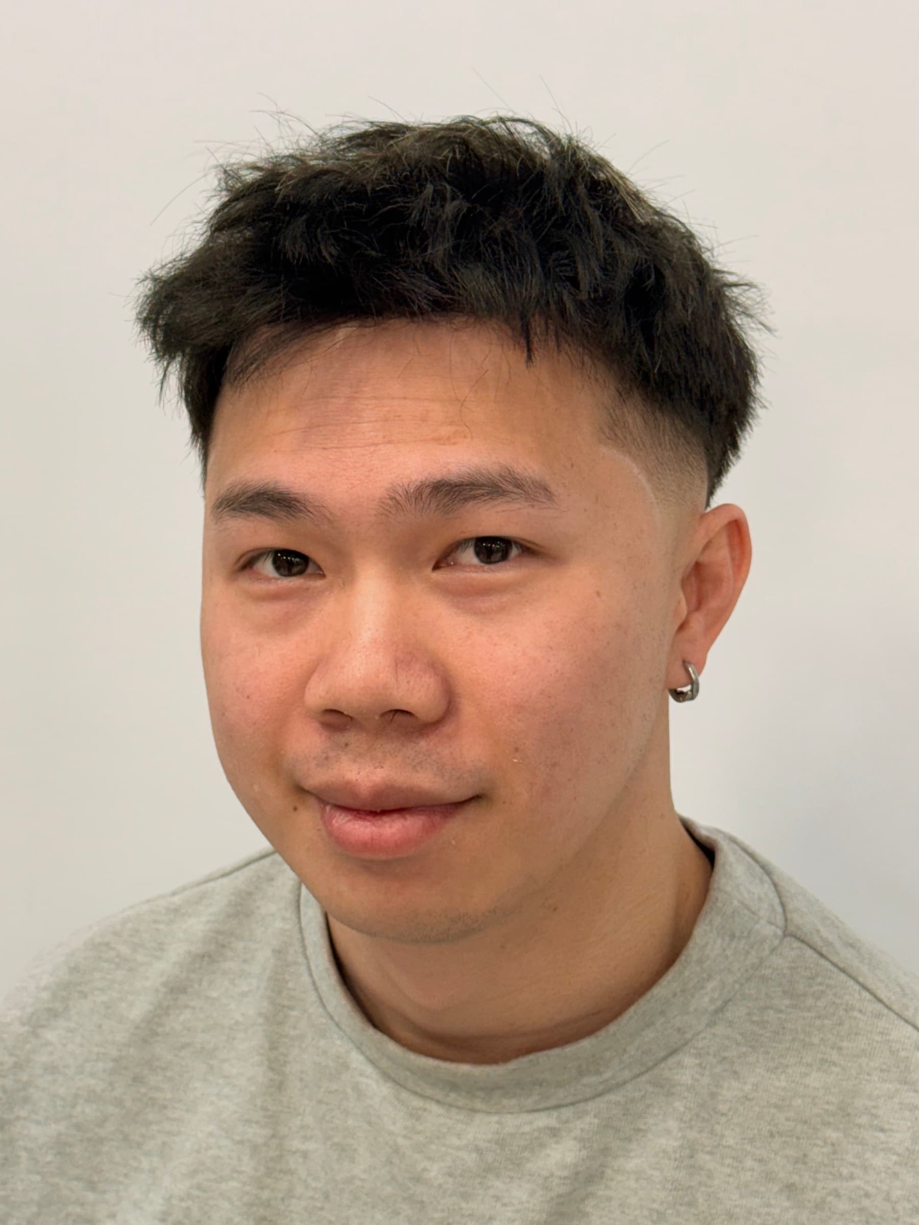 Finished hair system with natural front density.